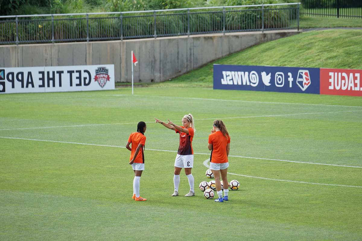 maryland soccerplex photo of woman standing on soccer field boyds